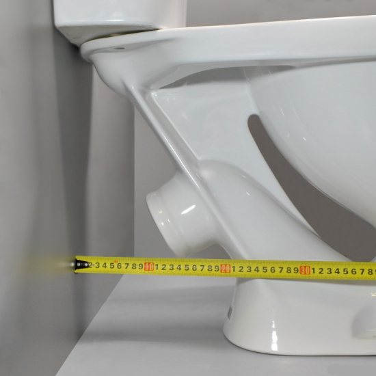 Унитаз компакт SANITA Формат стандарт с сиденьем полипропилен, косой выход, белый