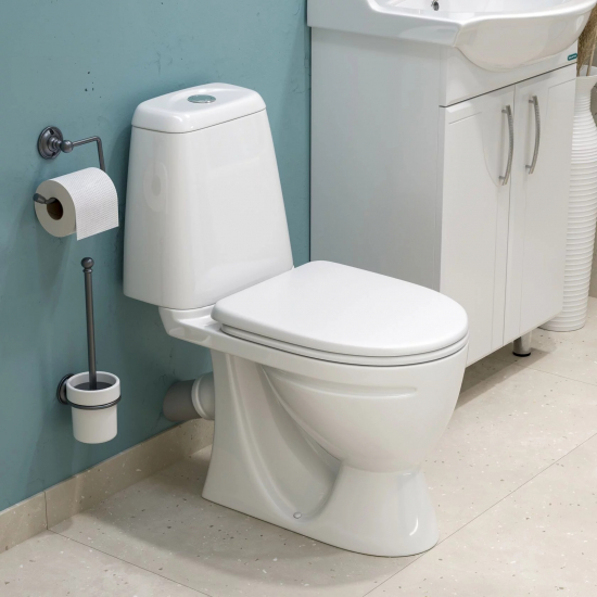 Унитаз компакт SANITA Идеал Стандарт с сиденьем полипропилен, косой выход, белый