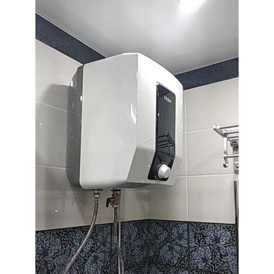 Водонагреватель накопительный HAIER ES15V-Q1(R) над раковиной